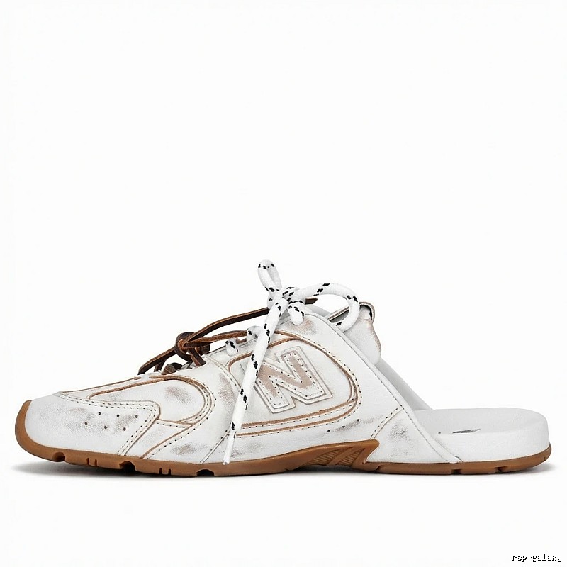 Miu Miu retro-style white slippers