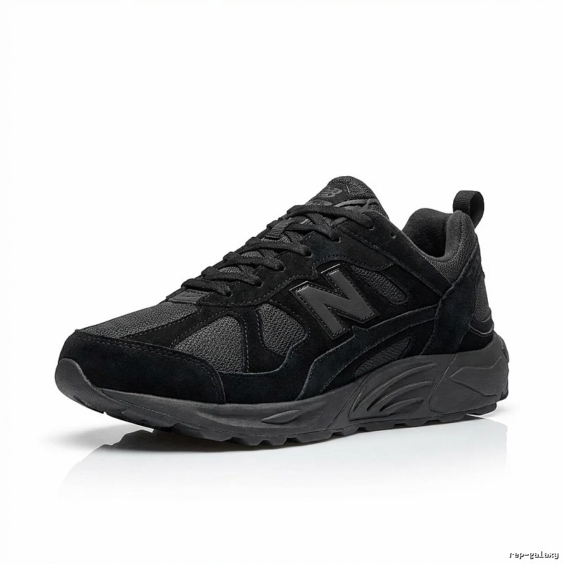 New Balance retro-style black and grey sports shoes