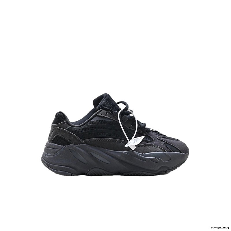 Retro-style black Yeezy 700 shoes